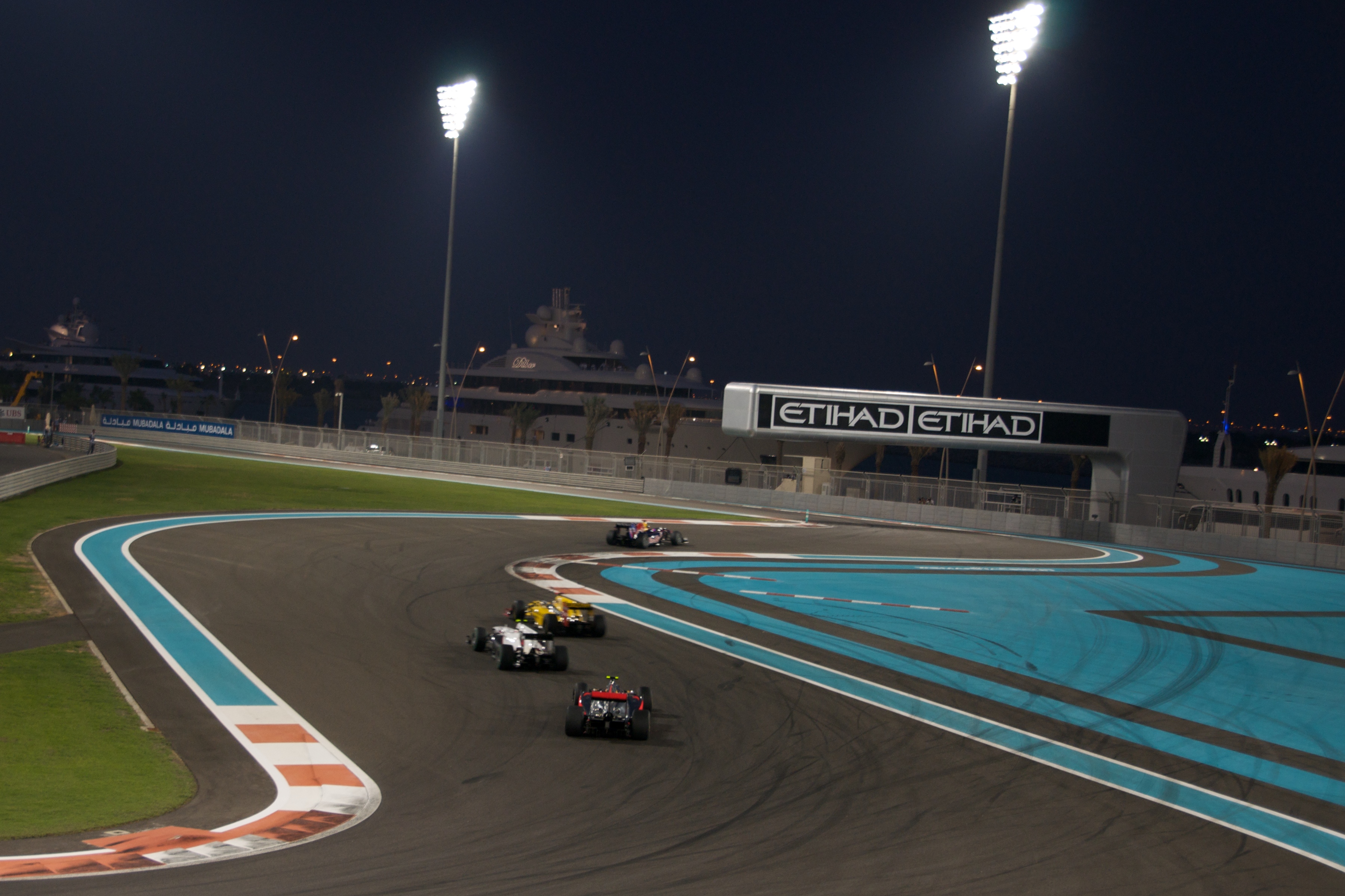 Yas Marina Circuit illuminated at night, host of the Abu Dhabi Grand Prix